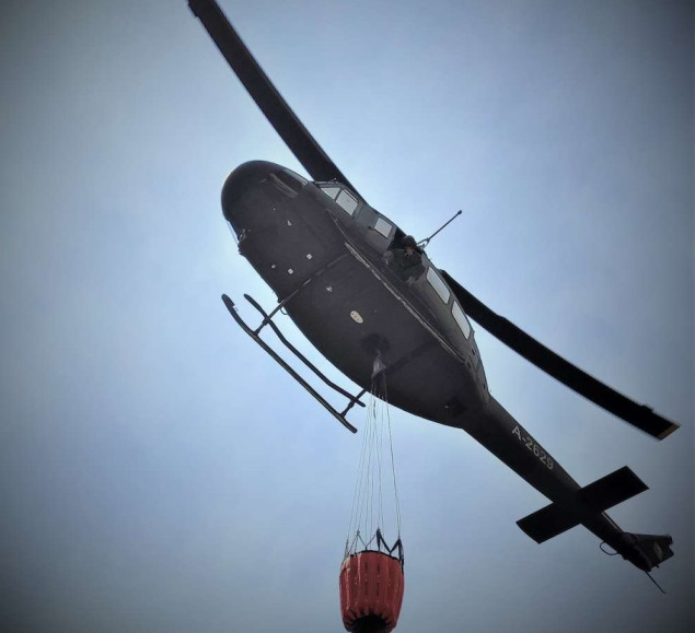 Helikopter OS BiH od jutros iznad Grahova, požar se i dalje širi
