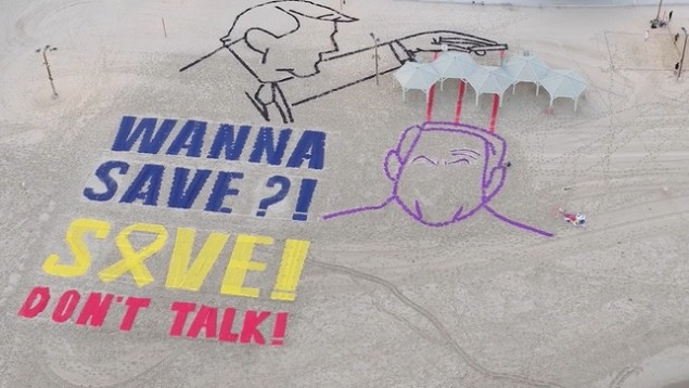 Izraelski aktivisti pozivaju na oslobađanje talaca porukom na plaži u blizini američke ambasade