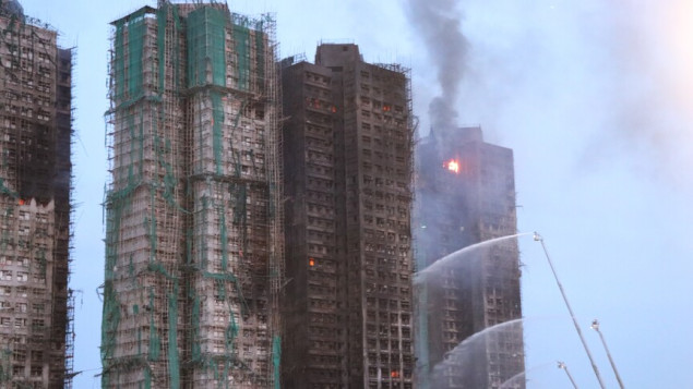 Devet osoba i dvije kompanije optužene nakon požara u Hong Kongu u kojem je poginulo 168 ljudi